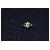 14 kt gold ring set with 3 marquis emeralds & 20 d