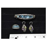 Sterling silver with 18 kt gold highlights jewelry