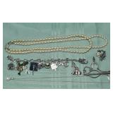 Sterling silver charm bracelet with charms, silver