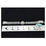 Sterling silver with 18 kt gold highlights woven b