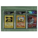 Lot of 3 graded Pokï¿½mon cards: 2 Base set HGA 9
