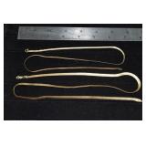 Two 14 kt gold herringbone necklaces: 24' and 20',