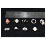 Marked 14 kt gold jewelry: 9 rings set with diamon