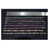 Marked 14 kt gold jewelry: 8 tennis bracelets set