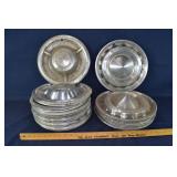 12 vintage Chevy aluminum hub caps: 7 Corvette, 5