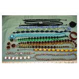 Vintage costume jewelry necklaces and bracelets in