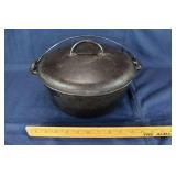 Griswold #9 cast iron Dutch oven with lid and  bal