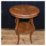 Ca. 1910 round tiger oak parlor table with stretch