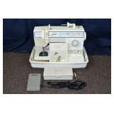 Singer electronic control portable sewing machine;