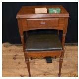 Singer sewing machine with mahogany cabinet and ac