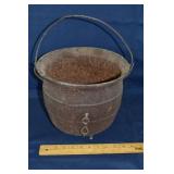 Antique cast iron footed stew pot with bale handle
