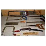 11 assorted hand saws; as is