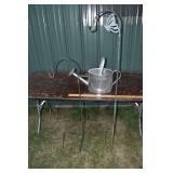 Lot: 2 shepherd crooks, watering can; as is