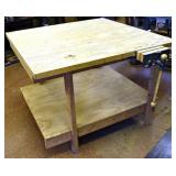 Wooden work bench with screw vise, 48x48x36"h; as