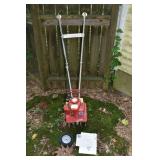 Mantis 2 stroke garden tiller with edger attachmen