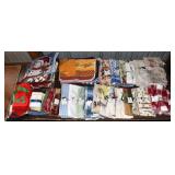 Large lot of table and kitchen linens; as is