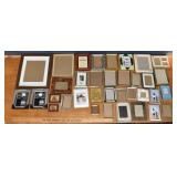 35 portrait frames, largest 12x16"h; as is