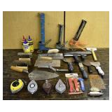 Masonry lot: trowels, chalk lines, plumb bobs, scr