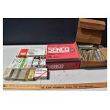 Collection of pneumatic nail gun nails; as is