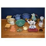 Group of pottery table wares: cookie jar, bowls,