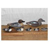 7 wooden decoys: green winged teal pair carved by
