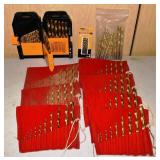 Collection of gold toned high speed drill bits; as