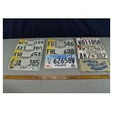 11 auto license plates; as is