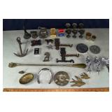Collection of assorted metal decorative objects; a