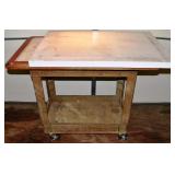 Plastic cart with wooden counter top 42x24x34'h; a