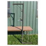 Steel 7' hitch mounted swivel cable hoist; as is