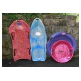 4 snow sleds; as is