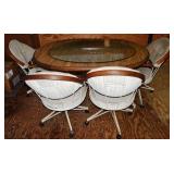 Kitchen table and 4 steel framed upholstered swive