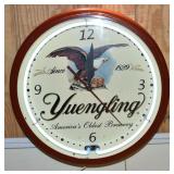 Yuengling working neon wall clock, 19' diameter; a