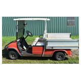 Yamaha utility golf cart and autographed football