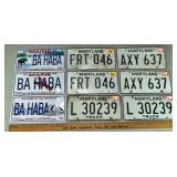 6 Maryland and 3 Maine license plates; as is
