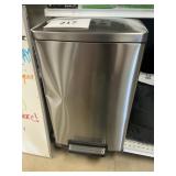 Tramontina 13 gal step on trash can-dented