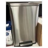 Tramontina 13 gal step on trash can -dented
