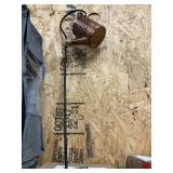 Solar stake watering can