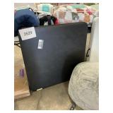 Black folding card table