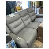 Gray leather type sofa w/ recliner ends - torn