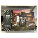 Pre-lit inflatable giant skeleton