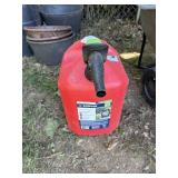 5 gal gas can w/ some fuel