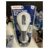 Suction assist grab bar