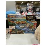 Hot Wheels racer verse Jurassic World