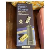 Rechargeable water flosser