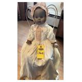 Antique Black Doll And Metal Chair