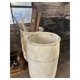 2 Plastic Barrels And Wood