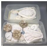 Totes of Plaster Foot Prints