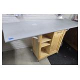 Padded Top Rolling Table w Cabinet 66Lx24Dx36H
