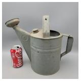 Water Can Galvanized Has been painted